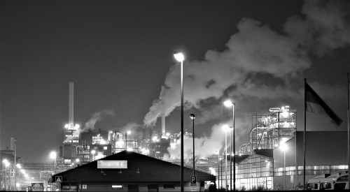 grayscale photography of a factory